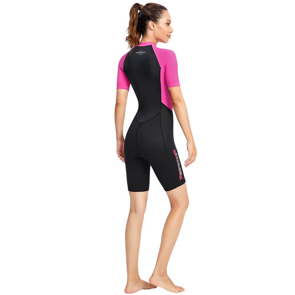 Women's pink and black 1.5mm neoprene wetsuit designed for surfing and diving, showcasing a snug, stylish fit for water sports.